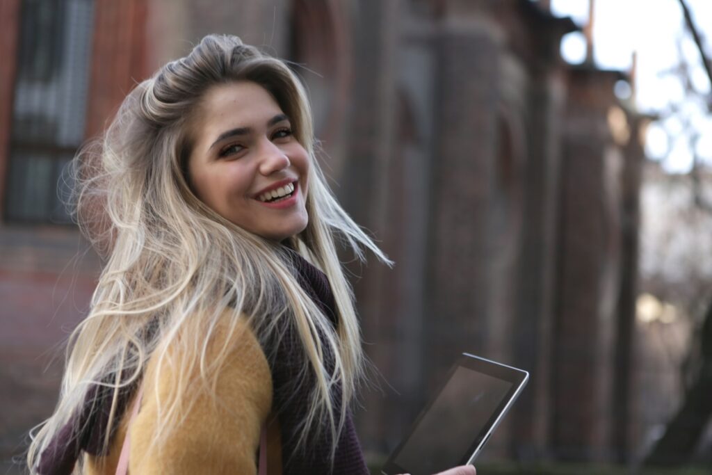 Smiling woman with light makeup