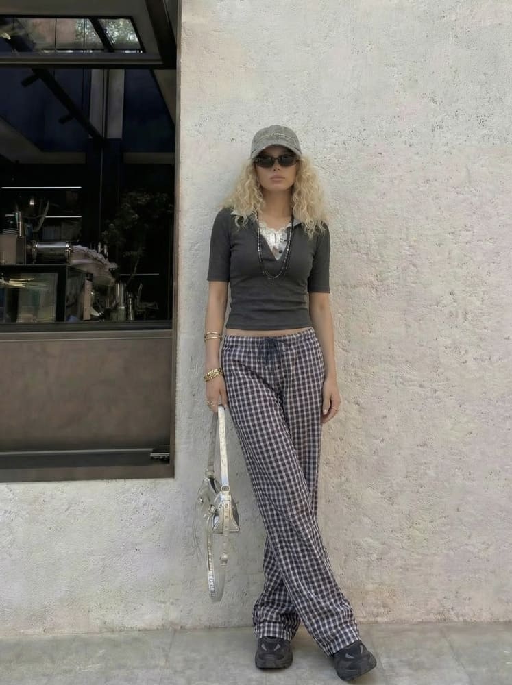 how to look taller in photos-put one leg slightly in front of the other after