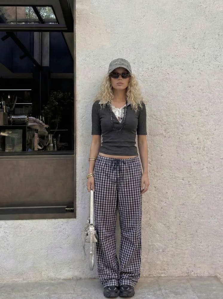 how to look taller in photos-put one leg slightly in front of the other before